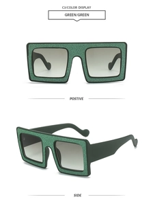 Detail of square glitter sunglasses in green showing front and side views clearly