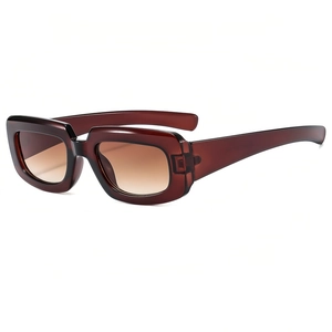 Retro futuristic square sunglasses with translucent burgundy frame and brown gradient lens