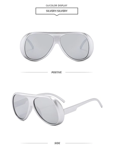 Front- und Seitenansicht der silbernen Oversize-Radsport-Sonnenbrille im futuristischen Look