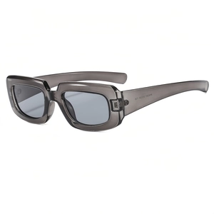 Punk rectangular sunglasses with translucent grey frames and light blue lenses