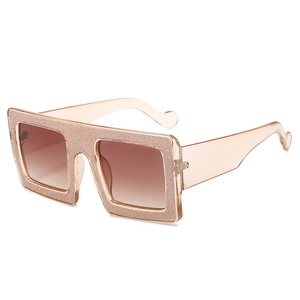 Stylish oversized square sunglasses with sparkling champagne gold glitter and gradient lenses