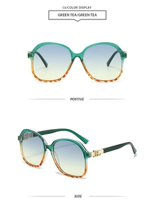 Detail view of square oversized sunglasses with green tea gradient frames and gold hinges