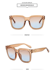 Detail view of square frame sunglasses in brown gradient with gold circle accents