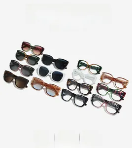 Collection of retro cat-eye sunglasses and blue light glasses in various colors