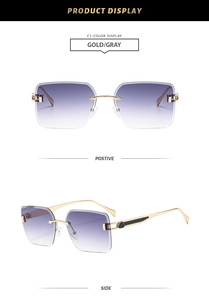 Detail view of gold rimless sunglasses with square gradient gray lenses and side temples