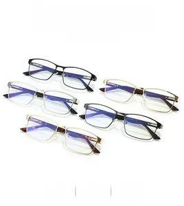 Detailed flat lay of rectangular anti-blue light glasses in black, gold, and silver