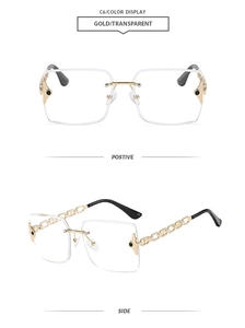Detail of rimless square sunglasses with gold hollow chain temples and transparent lenses