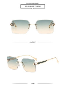Detail view of rimless square sunglasses with gold metal frame and green yellow gradient lenses