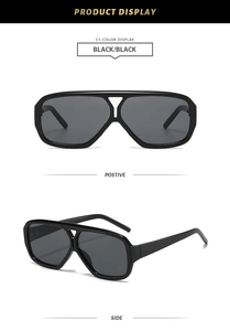 Detail view showing front and side profiles of black aviator sunglasses with double bridge
