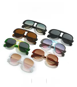 Collection of oversized pilot sunglasses in diverse gradient colors and fashion frames