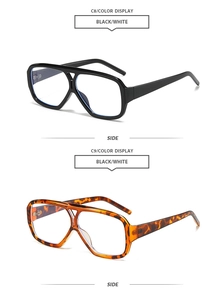 Detail of vintage double-bridge sunglasses in classic black and tortoise shell frames