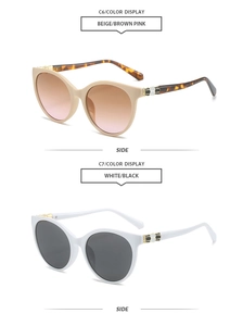 Detail of snake scale metal hinges on vintage cat-eye sunglasses with gradient lenses