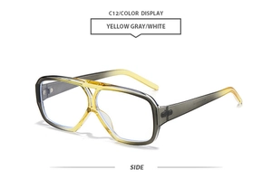 Detail of yellow-gray gradient double-bridge aviator frames from a 45-degree side angle