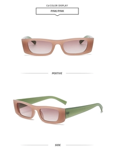 Detail view of pink rectangular sunglasses with contrasting green arms and gradient lenses