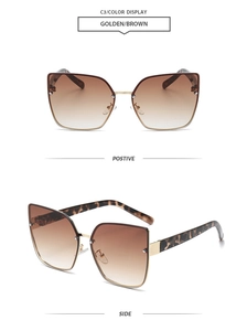 Detail of rimless cat eye sunglasses with golden frame and brown gradient lenses