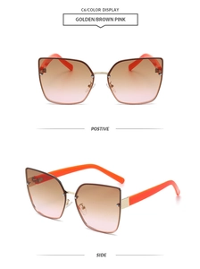 Detail of rimless cat-eye sunglasses with golden bridge and vibrant orange temples