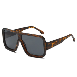 Oversized square tortoiseshell sunglasses with dark gray lenses shown from a 45-degree angle