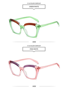 Side view of retro cat-eye glasses frames in green and pink transparent acetate