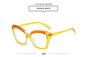 Side view of cat-eye glasses with orange and white gradient frames and metal hinges