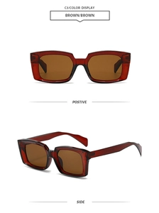 Macro detail of rectangle sunglasses with deep red frame and brown lenses