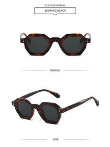 Detail view of stylish leopard print geometric sunglasses with dark black lenses