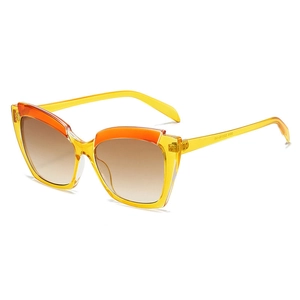 Vintage cat eye sunglasses with yellow frames and orange accents for a retro look