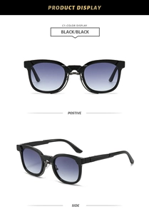 Detail view of retro sunglasses with black frames and blue-purple gradient lenses