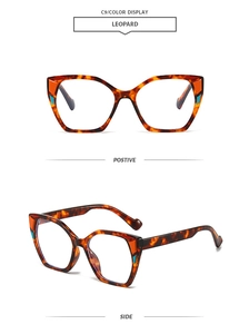 Detail view of leopard print square sunglasses with blue geometric accent blocks