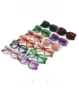 Close-up display of stylish square sunglasses in diverse colorful frames and lenses