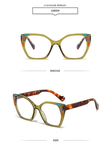 Detail of green cat-eye sunglasses with colorful blocks and tortoise shell temples