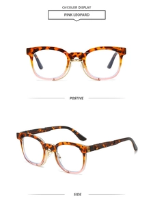 Detail of pink leopard print round frame sunglasses with golden metal nose bridge