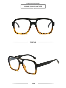 Detail view of classic double-bridge pilot sunglasses in black leopard finish