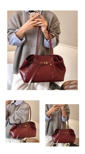 Détail du sac cabas en cuir bordeaux avec sangle à boucle et surpiqûres blanches contrastées