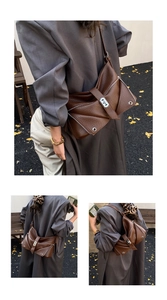 Close-up of geometric dark brown litchi pattern leather texture and silver zipper details