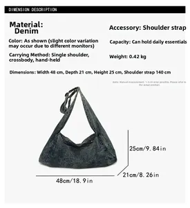 Detail of gray denim hobo bag showing adjustable strap and 48x21x25cm size specifications
