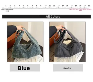 Detail view of denim hobo tote bag in blue and black with 20cm scale for size reference