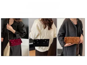 Detail showing multiple ways to wear the suede flap bag with metal rivets and chain strap