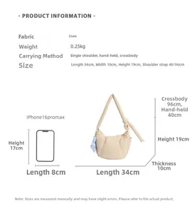 Size comparison of beige quilted puffer bag with iPhone showing its large capacity