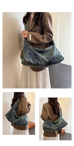 Three-angle views showing the washed denim shoulder bag texture and spacious tote design