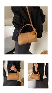 Détails du sac à bandoulière marron vintage avec anneaux dorés et texture en cuir fin