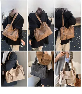 Détails du sac à main rétro grande capacité avec plusieurs poches et texture vintage