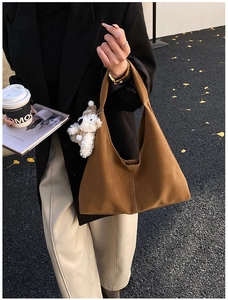 Brown suede large hobo tote bag with teddy bear pendant and decorative stitching