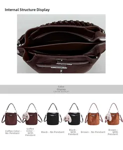 Detail view of bucket bag interior structure and woven strap in coffee, black and brown