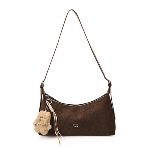 Dark brown retro hobo bag with pleated leather texture and plush bear charm
