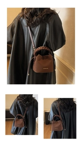 Brown leather bucket bag detail with woven handle and elegant drawstring closure