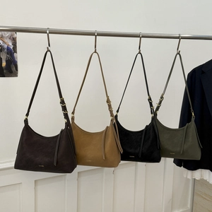 Minimalist leather hobo shoulder bags in brown, black and green colors for women
