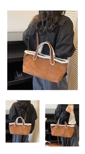 Close-up of brown suede tote bag with white faux shearling trim and dual handles