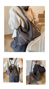 Detail of dark grey matte vintage tote bag showing versatile shoulder and backpack straps