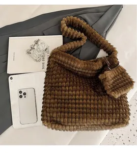 Detailed view of brown plush tote bag set with grid texture and matching pouch