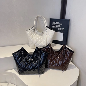 Minimalist large capacity tote bags with glossy quilted finish in black, white, and brown